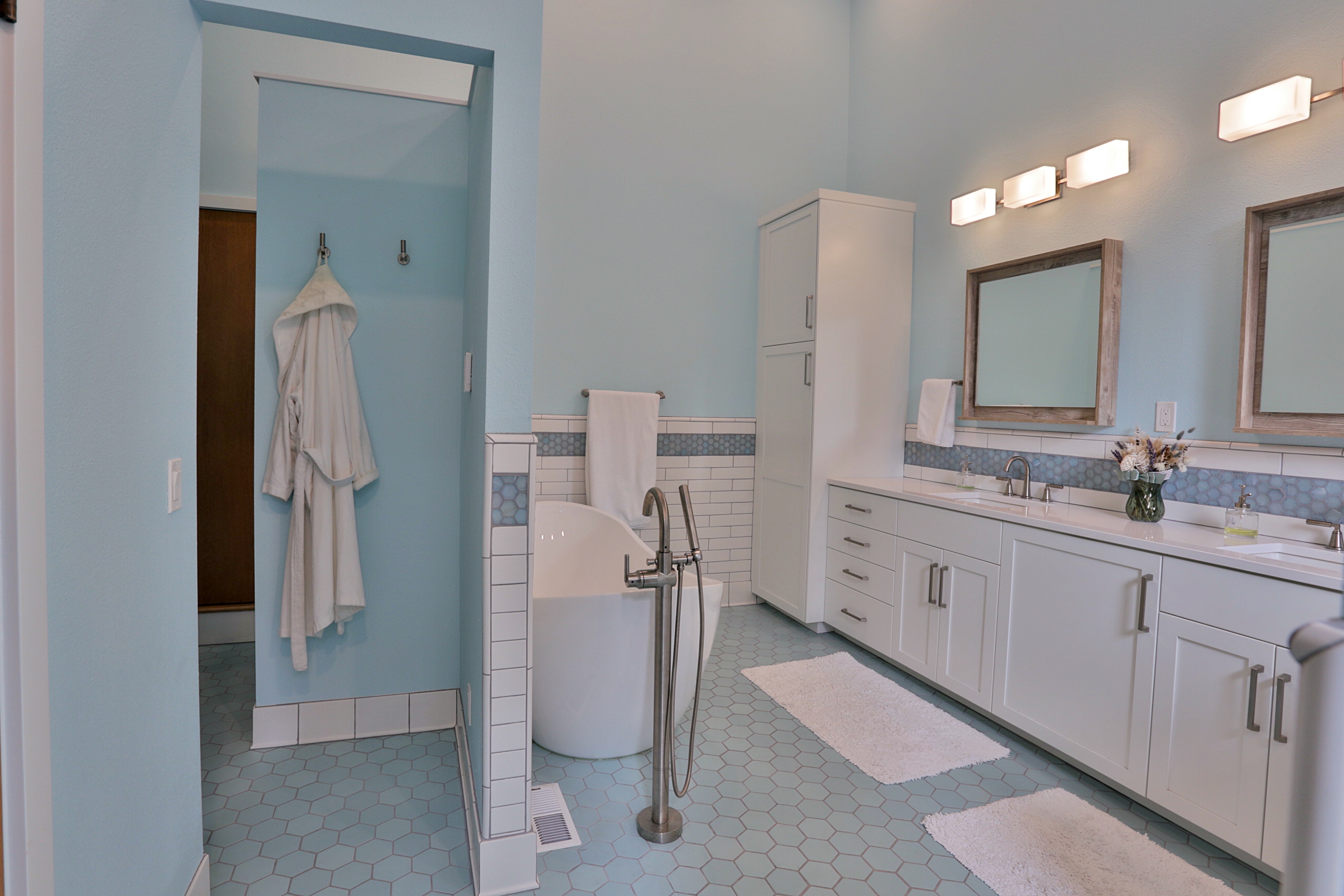 Walk-in shower with natural stone in Portland bathroom remodel